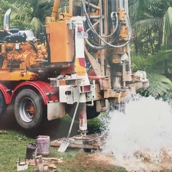 water exploding from new water bore drilling sunshine coast project